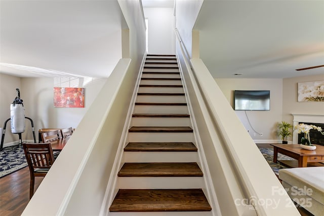 2015 Savannah Hills Dr, Matthews, NC 28105 - stairs with ceiling fan and wood finished floors