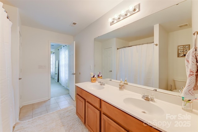 2015 Savannah Hills Dr, Matthews, NC 28105 - full bathroom with double vanity and tile patterned floors