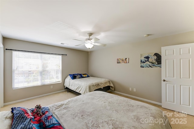 2015 Savannah Hills Dr, Matthews, NC 28105 - bedroom with light colored carpet and ceiling fan