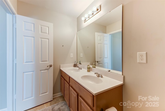 2015 Savannah Hills Dr, Matthews, NC 28105 - bathroom with double vanity and tile patterned floors