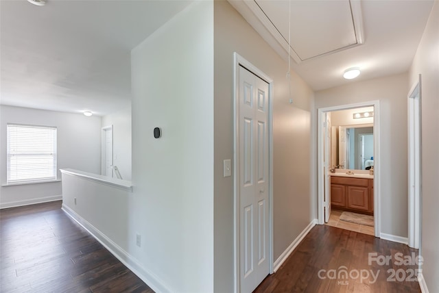 2015 Savannah Hills Dr, Matthews, NC 28105 - corridor featuring attic access and dark wood-style floors