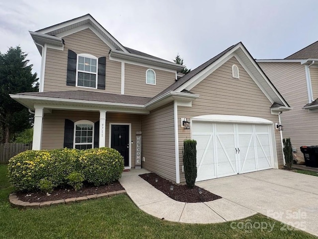 9711 Marquette St NW, Concord, NC 28027 - traditional home with a garage, driveway, and covered porch