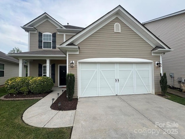 9711 Marquette St NW, Concord, NC 28027 - traditional-style house with an attached garage, driveway, and covered porch