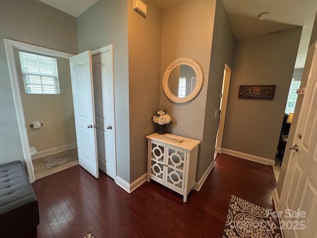 9711 Marquette St NW, Concord, NC 28027 - corridor featuring wood finished floors and baseboards
