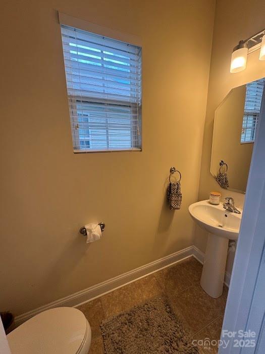 9711 Marquette St NW, Concord, NC 28027 - half bathroom featuring tile patterned flooring