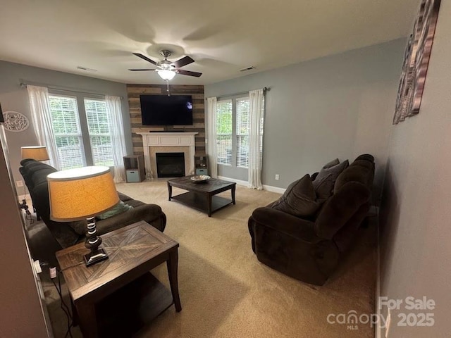 9711 Marquette St NW, Concord, NC 28027 - living area with ceiling fan, a high end fireplace, light carpet, and healthy amount of natural light