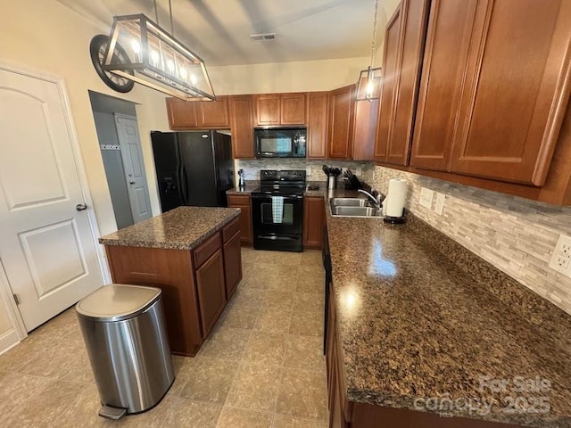 9711 Marquette St NW, Concord, NC 28027 - kitchen with black appliances, decorative backsplash, brown cabinetry, a center island, and hanging light fixtures