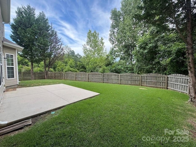 9711 Marquette St NW, Concord, NC 28027 - fenced backyard featuring a patio area