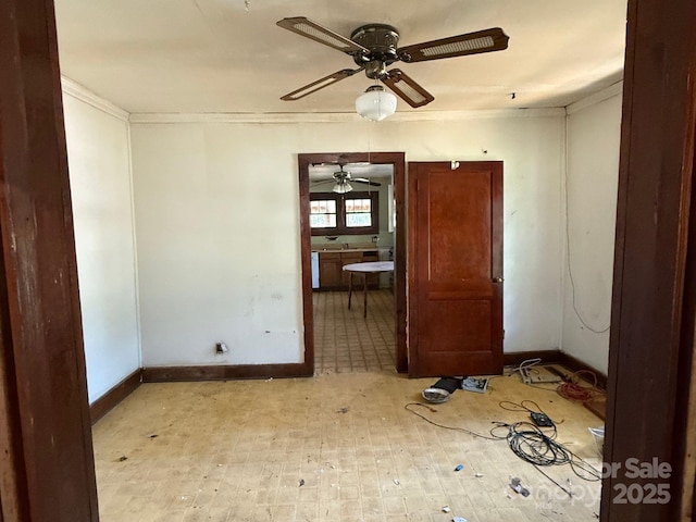 410 24th St SW, Hickory, NC 28602 - empty room with baseboards and a ceiling fan