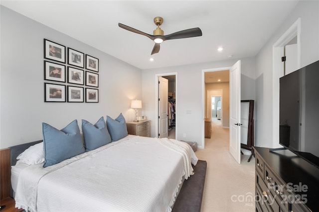5941 Mantle Way, Kannapolis, NC 28081 - bedroom featuring light colored carpet, a walk in closet, recessed lighting, and a ceiling fan