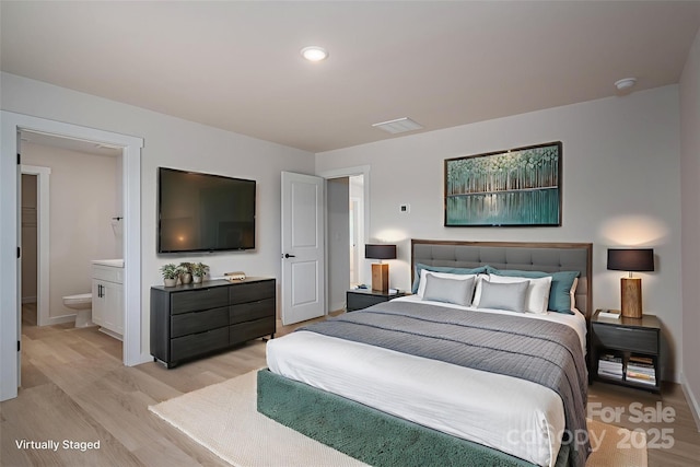 837 32nd St NE, Conover, NC 28613 - bedroom featuring light wood-style floors, recessed lighting, and ensuite bathroom