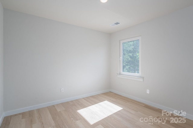 837 32nd St NE, Conover, NC 28613 - unfurnished room with light wood finished floors and baseboards