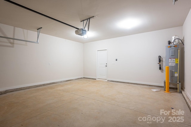 837 32nd St NE, Conover, NC 28613 - garage with electric water heater and a garage door opener
