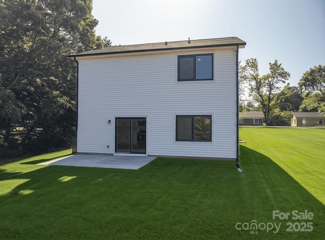 837 32nd St NE, Conover, NC 28613 - back of house featuring a patio and a lawn