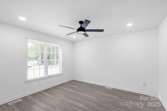 801 Evening Shade Ln, Gastonia, NC 28052 - empty room featuring wood finished floors, ceiling fan, and recessed lighting