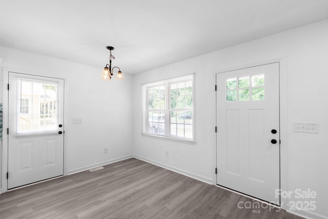 801 Evening Shade Ln, Gastonia, NC 28052 - entryway with wood finished floors and a chandelier