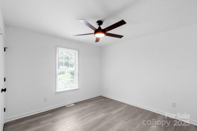801 Evening Shade Ln, Gastonia, NC 28052 - unfurnished room with a ceiling fan and wood finished floors