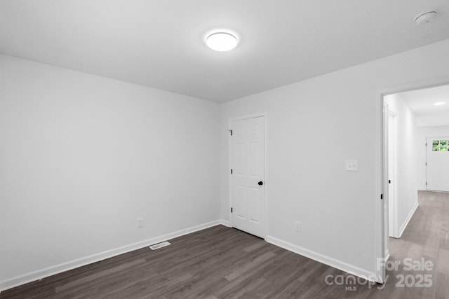 801 Evening Shade Ln, Gastonia, NC 28052 - empty room with dark wood-style floors and baseboards