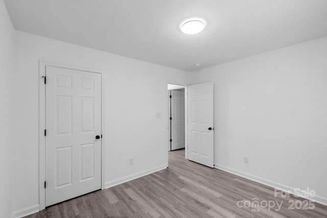 801 Evening Shade Ln, Gastonia, NC 28052 - unfurnished bedroom with wood finished floors