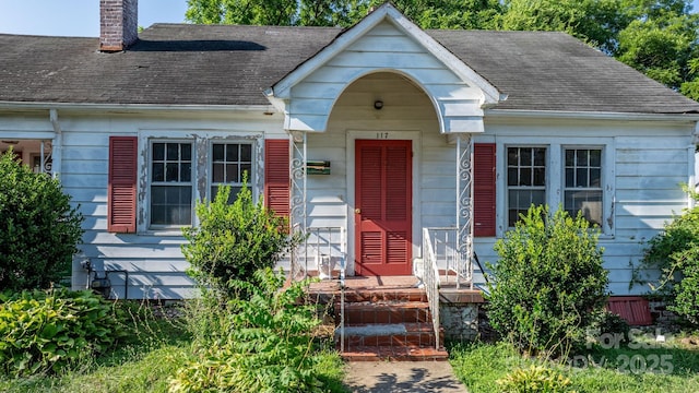 117 3rd Ave SW, Hickory, NC 28602 - view of front of house with a chimney and roof with shingles