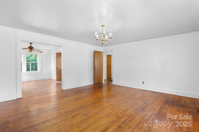 117 3rd Ave SW, Hickory, NC 28602 - unfurnished room featuring a chandelier, hardwood / wood-style floors, and a ceiling fan