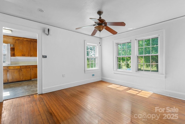 117 3rd Ave SW, Hickory, NC 28602 - empty room featuring dark wood-type flooring and ceiling fan