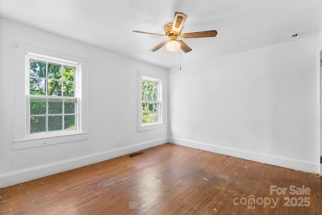 117 3rd Ave SW, Hickory, NC 28602 - spare room with hardwood / wood-style flooring and a ceiling fan