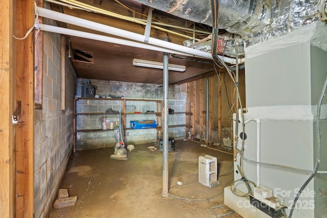 117 3rd Ave SW, Hickory, NC 28602 - unfinished below grade area with concrete block wall and heating unit