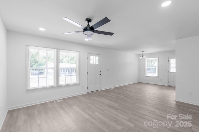 803 Evening Shade Ln, Gastonia, NC 28052 - foyer with a ceiling fan, healthy amount of natural light, wood finished floors, a chandelier, and recessed lighting