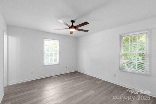 803 Evening Shade Ln, Gastonia, NC 28052 - spare room featuring wood finished floors and ceiling fan