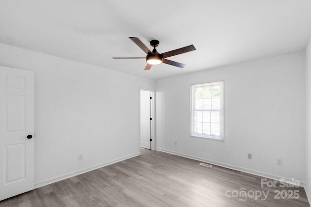 803 Evening Shade Ln, Gastonia, NC 28052 - spare room with wood finished floors and a ceiling fan