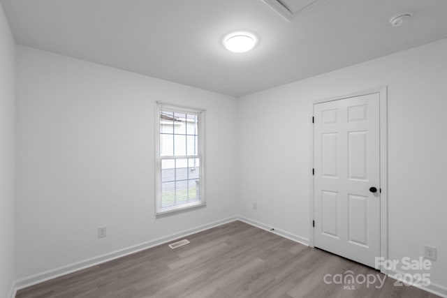 803 Evening Shade Ln, Gastonia, NC 28052 - unfurnished room with wood finished floors and baseboards