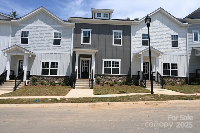185 Cherry Springs Ln Unit 24-C, Asheville, NC 28804 - view of property with board and batten siding and stone siding