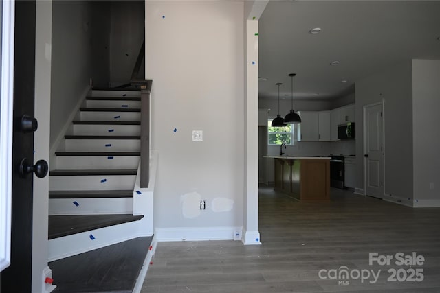 185 Cherry Springs Ln Unit 24-C, Asheville, NC 28804 - stairway with wood finished floors and baseboards