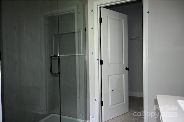 185 Cherry Springs Ln Unit 24-C, Asheville, NC 28804 - full bathroom featuring a stall shower and baseboards