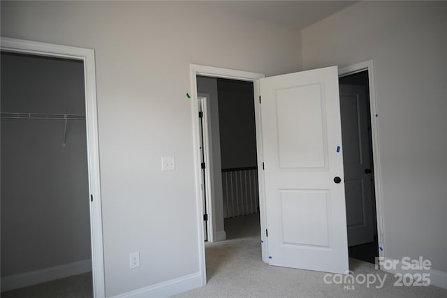 185 Cherry Springs Ln Unit 24-C, Asheville, NC 28804 - unfurnished bedroom with a closet and carpet
