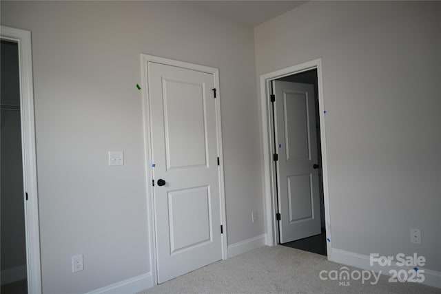 185 Cherry Springs Ln Unit 24-C, Asheville, NC 28804 - unfurnished bedroom with carpet and baseboards