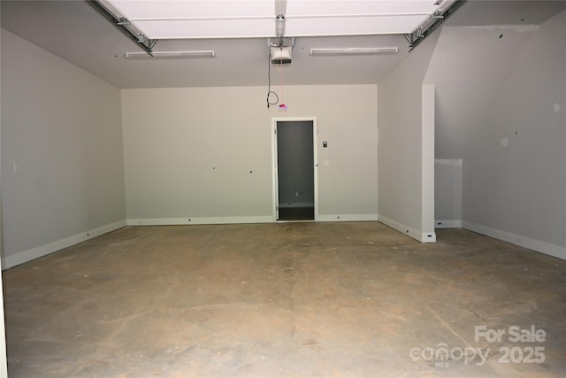 185 Cherry Springs Ln Unit 24-C, Asheville, NC 28804 - garage featuring a garage door opener and baseboards