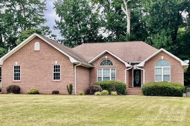 205 Hidden Spring Dr, Salisbury, NC 28147 - single story home with a front lawn and brick siding