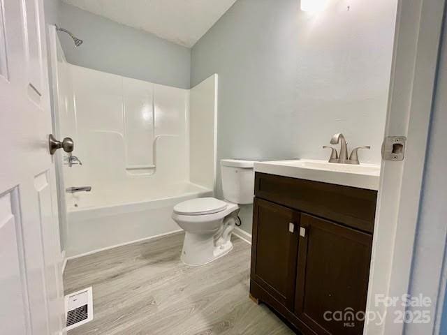 205 Hidden Spring Dr, Salisbury, NC 28147 - full bath featuring vanity, wood finished floors, and bathtub / shower combination