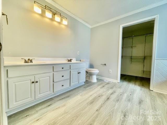 205 Hidden Spring Dr, Salisbury, NC 28147 - bathroom with ornamental molding, wood finished floors, and double vanity