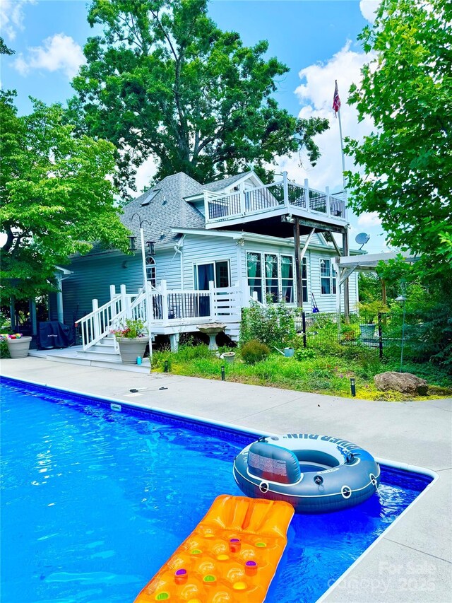 227 Reep Dr, Morganton, NC 28655 - swimming pool featuring a deck and a jacuzzi