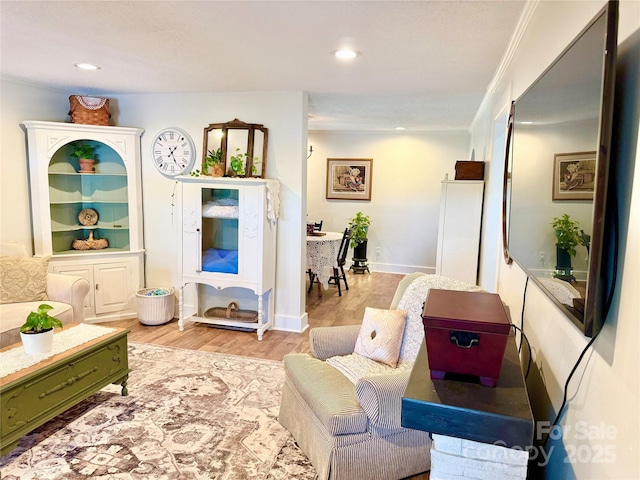 227 Reep Dr, Morganton, NC 28655 - living area featuring wood finished floors, recessed lighting, and ornamental molding