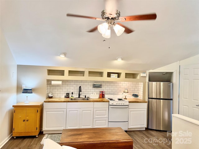 227 Reep Dr, Morganton, NC 28655 - kitchen with freestanding refrigerator, white range with electric cooktop, open shelves, and wood finished floors