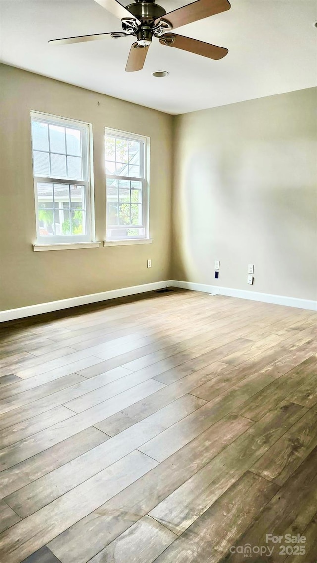 227 Reep Dr, Morganton, NC 28655 - empty room with hardwood / wood-style flooring and a ceiling fan