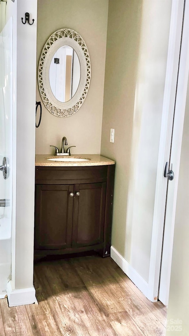 227 Reep Dr, Morganton, NC 28655 - bathroom featuring wood finished floors and vanity