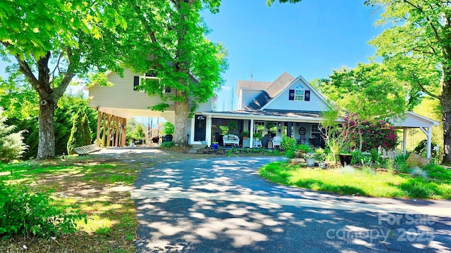 227 Reep Dr, Morganton, NC 28655 - view of front of house with a porch, driveway, and a carport