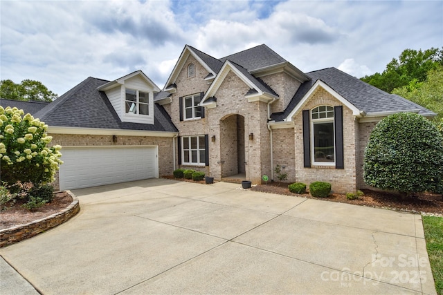 9221 Belle Pines Ct, Sherrills Ford, NC 28673 - view of front facade featuring brick siding, concrete driveway, and roof with shingles
