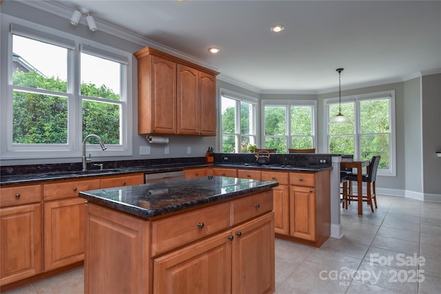 9221 Belle Pines Ct, Sherrills Ford, NC 28673 - kitchen with a kitchen island, light tile patterned floors, ornamental molding, stainless steel dishwasher, and plenty of natural light