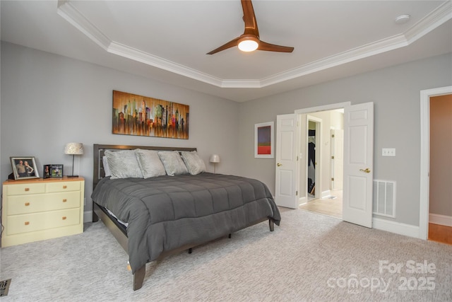 9221 Belle Pines Ct, Sherrills Ford, NC 28673 - bedroom featuring ornamental molding, a tray ceiling, carpet flooring, and a ceiling fan